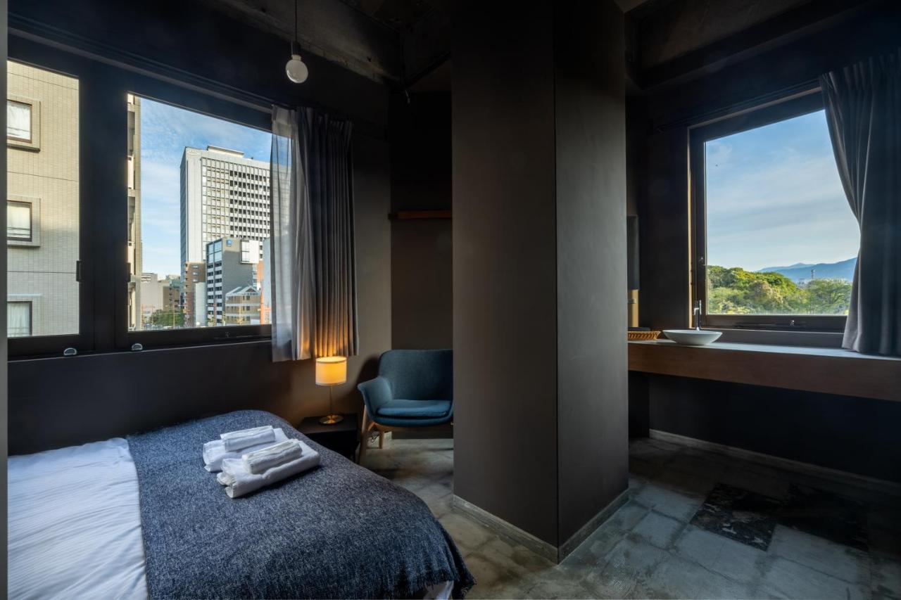 Хостел Unplan Fukuoka Фукуока Экстерьер фото